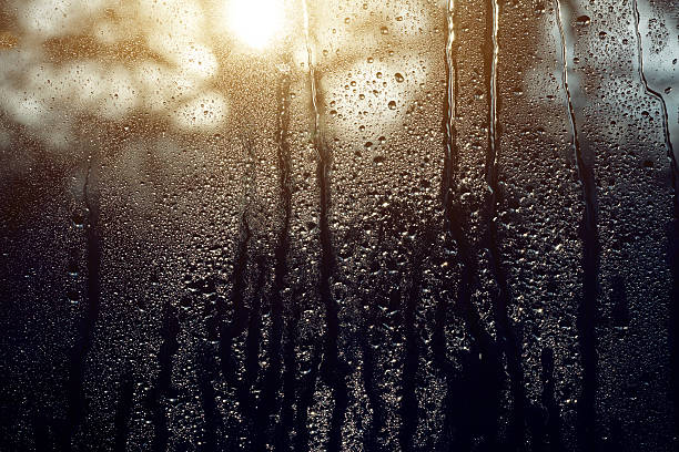 istock natural water drop on glass 502001630