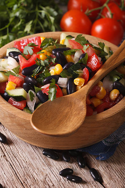 istock Mexican vegetable salad in bowl closeup and ingredients vertical 502001864