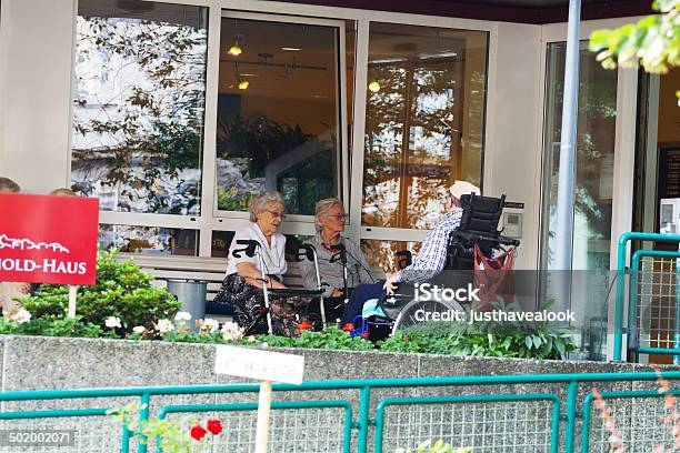 Seniors Outside Of Nursing Home Stock Photo - Download Image Now - Nursing Home, Active Seniors, Adult