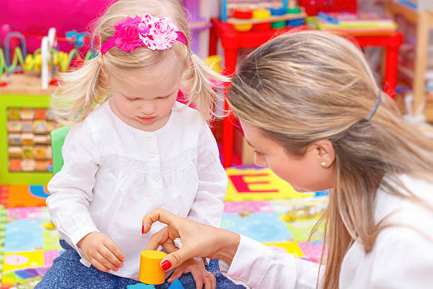 istock Little girl with mother having fun 502003258