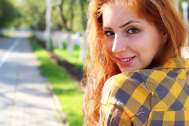 istock red-haired girl in a hat hipster 502004250