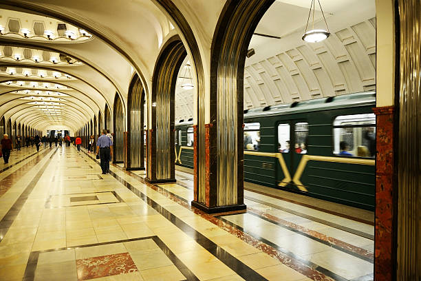 Moscow, Russia, August 30th 2015: Commuters and tourists in Mayakosvkaya Metro station.