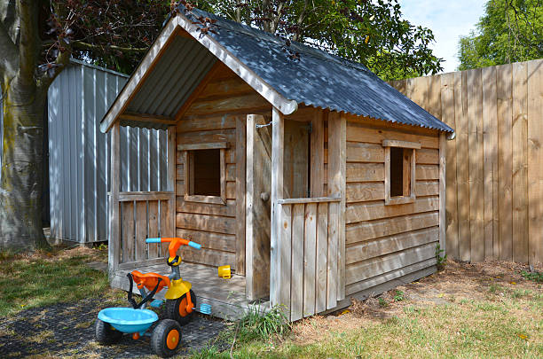 Children playhouse in the yard Children playhouse in the yard. Childhood concept kids play house stock pictures, royalty-free photos & images