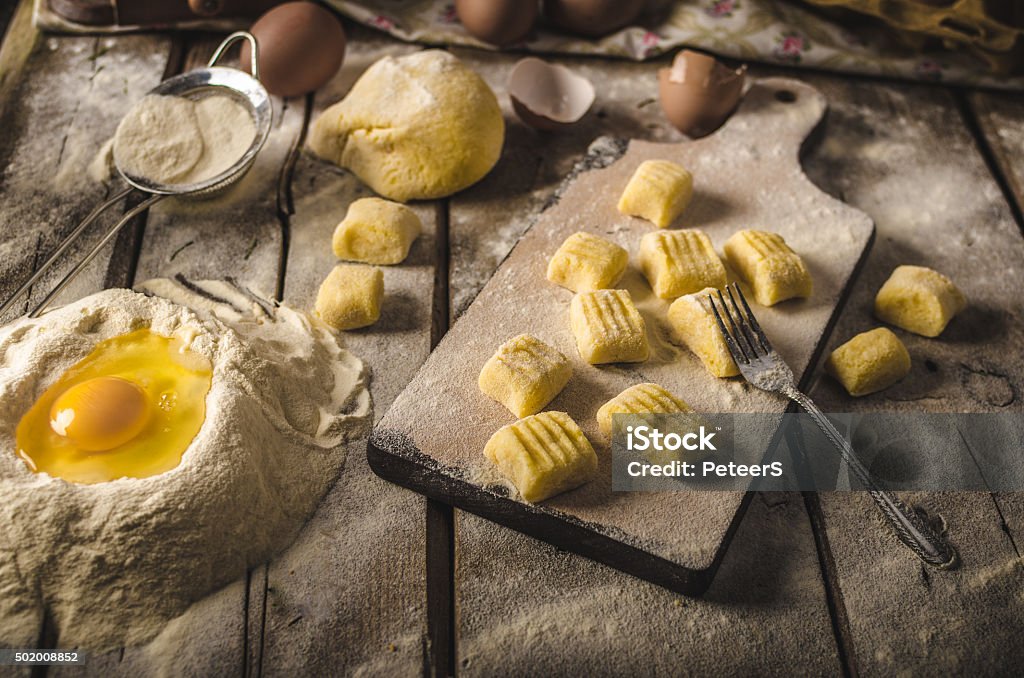 Homemade potato gnocchi Production of homemade potato gnocchi Gnocchi Stock Photo