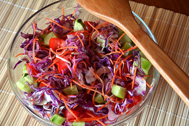 istock Healthy vegetable salad with red cabbageon a glass bowl 502010584