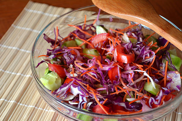 istock Healthy vegetable salad with red cabbageon a glass bowl 502011032