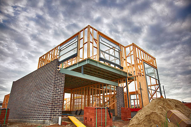Home under construction Home under construction construction material stock pictures, royalty-free photos & images