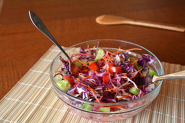 istock Healthy vegetable salad with red cabbageon a glass bowl 502011932