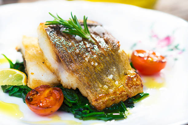istock Sea bass fillet with spinach 502014306