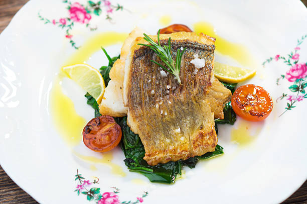 istock Sea bass fillet with spinach 502014382