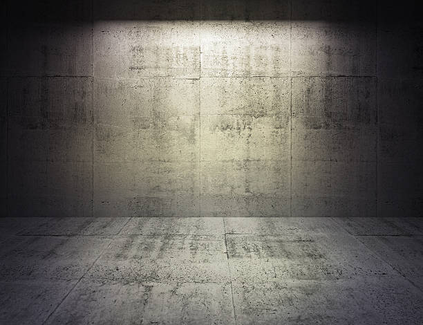 istock Abstract dark concrete 3d interior with spot light on wall 502018531