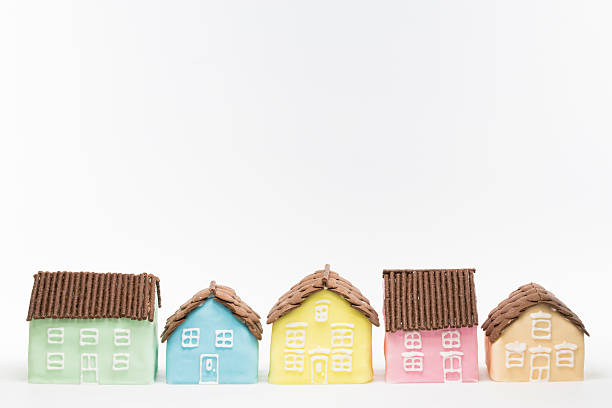 istock Red, blue, yellow and green cake house in a row. 502019977