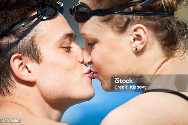 Swimmers In Love Stock Photo - Download Image Now - 18-19 Years, 20-29 Years, Adult