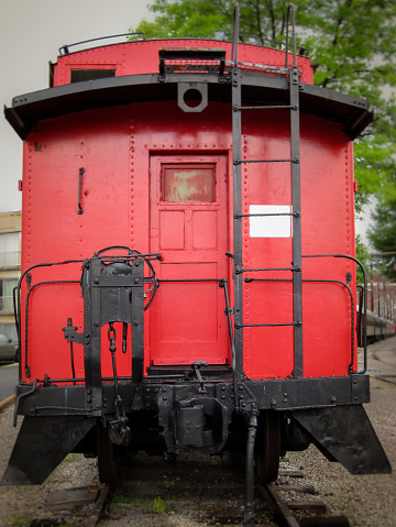 Bright red caboose at the rear of a train on display in Chattanooga, Tennessee