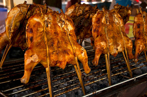 istock Grilled chicken was spread out with bamboo stick,Thailand 502025463
