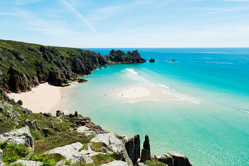 Pedn Vounder Beach near Porthcurno South Cornwall on a bright June day.