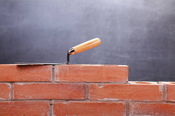 Wall Brick wall under construction solid stock pictures, royalty-free photos & images