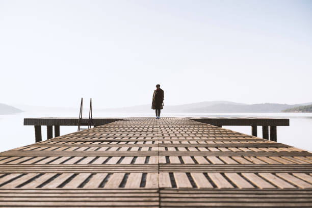istock Standing on the seaside jetty 502038730