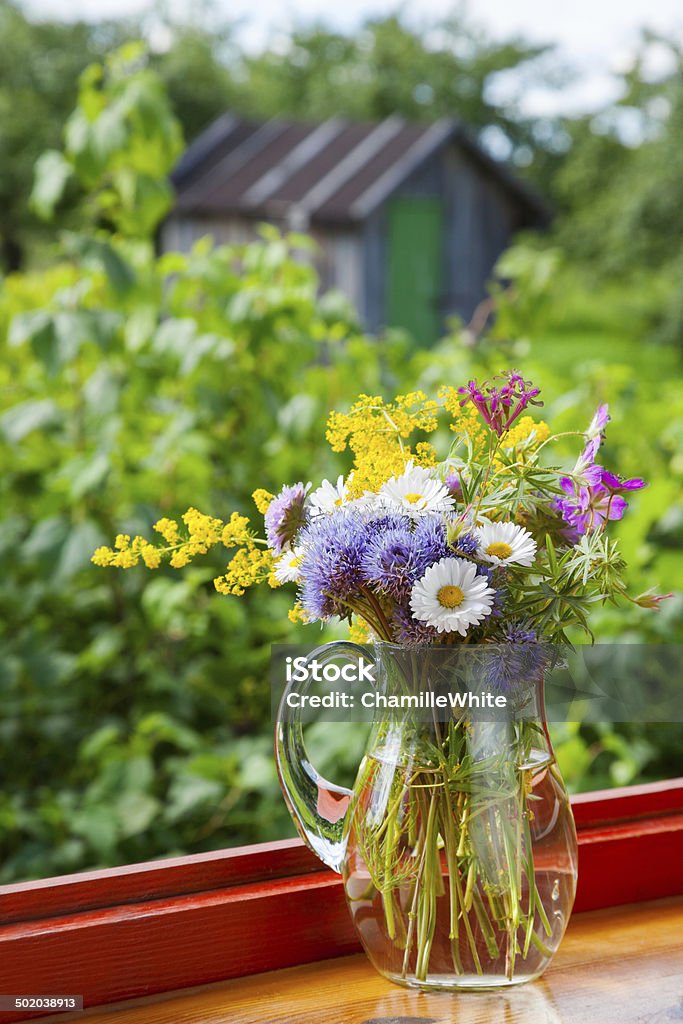 bouquet of summer flowers and healing herbs in jug bouquet of summer flowers and healing herbs in jug on windowsill Beauty In Nature Stock Photo