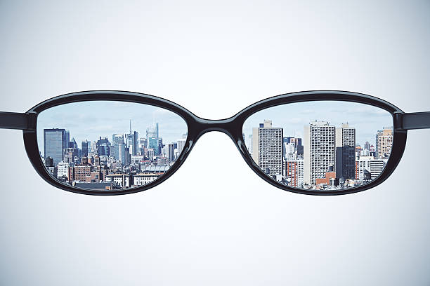 istock Clear vision concept with eyeglasses with megapolis city at whit 502038952