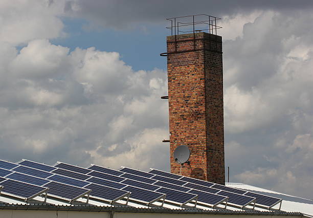istock Roof With Solar Panels And Chimney 502039345