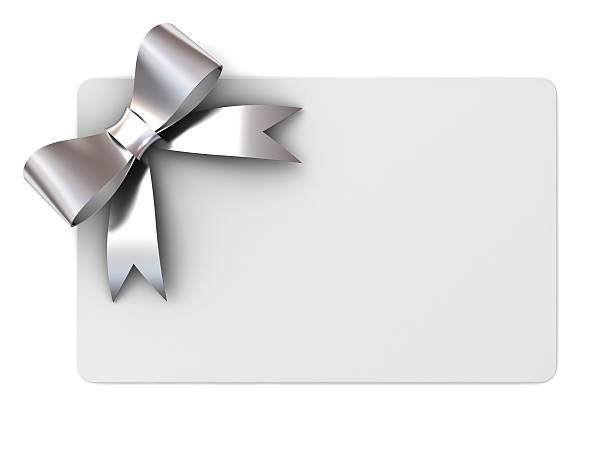 Blank gift card with silver ribbon bow Blank gift card with silver ribbons bow isolated on white background. gift tag note photos stock pictures, royalty-free photos & images