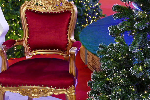 istock red velvet chair and christmas tree 502043446