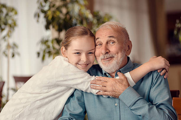 istock Young girl and grandfather 502043530