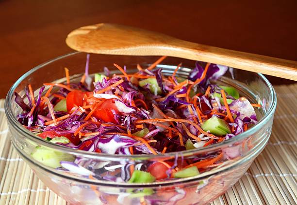 istock Healthy vegetable salad with red cabbageon a glass bowl 502044090