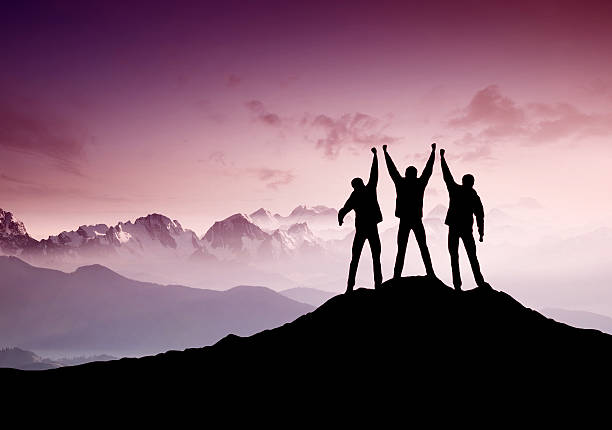 istock Silhouettes of team 502045428