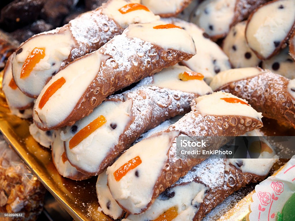 Food and pastry. Cannoli from Sicily Traditional and famous Sicilian cannoli, cream horns, with fresh cream and cedro. Cannoli Stock Photo