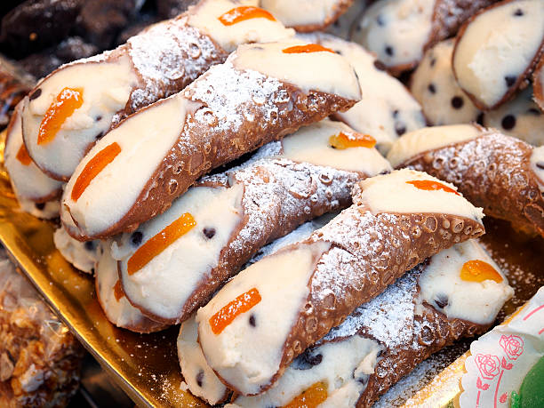 Food and pastry. Cannoli from Sicily Traditional and famous Sicilian cannoli, cream horns, with fresh cream and cedro. palermo sicily stock pictures, royalty-free photos & images