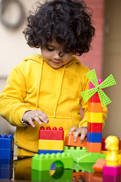 istock Little boy playing with toys 502051932