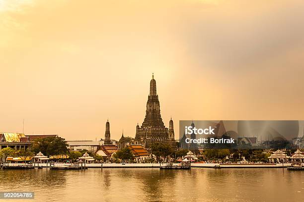 Wat Arun Thailand Temple In Sunset Scene Stock Photo - Download Image Now - Architecture, Arranging, Asia