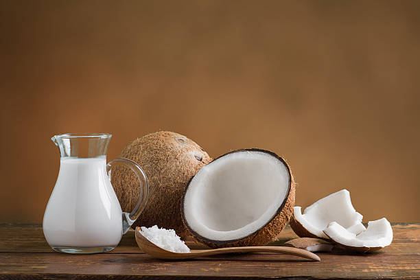 Coconut Milk with fresh coconut for alternative therapy Coconut Milk with fresh coconut for alternative therapy, spa theme coconut milk stock pictures, royalty-free photos & images