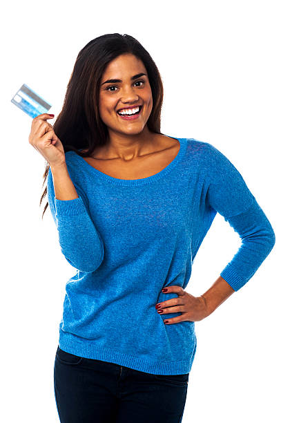 istock Pretty woman displaying her credit card 502056309