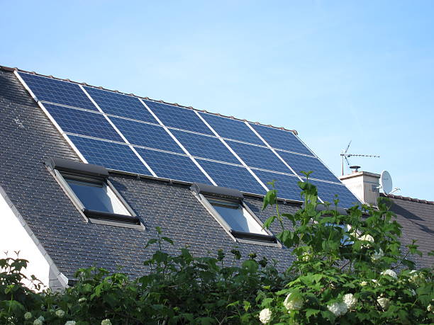istock House with solar panels on roof 502057623