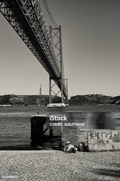 Sleeping In Lisbon Stock Photo - Download Image Now - Adult, April 25th Bridge, Black And White