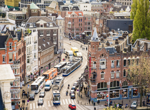 High angle view of traffic and pedestrians in central Amsterdam, Holland.