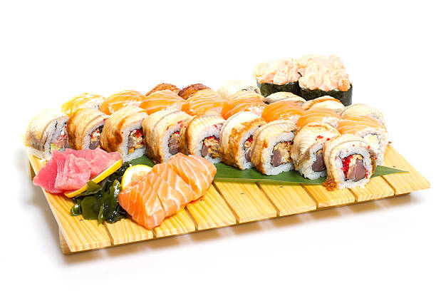 istock Sushi roll on a plate isolated on white background 502059015