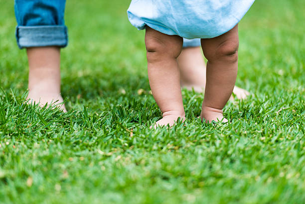 istock small baby feet 502060289
