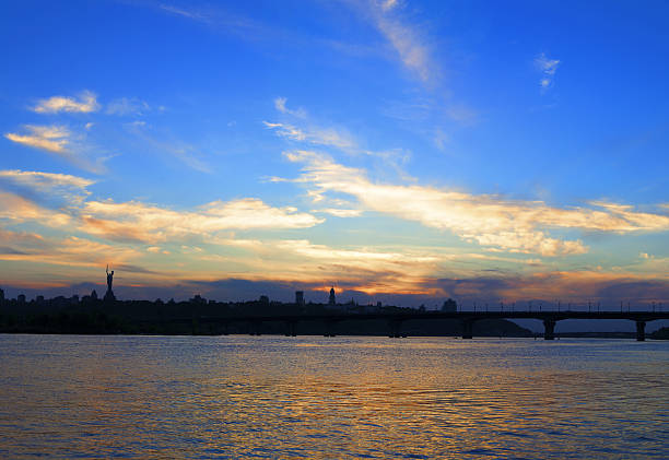 Sunset on the river Dnipro in Kyiv stock photo