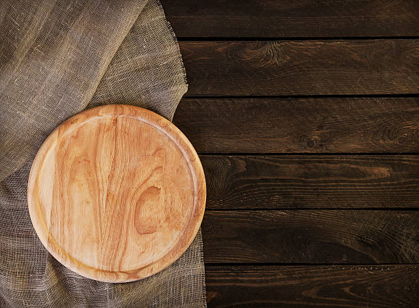 istock cutting board on wooden texture background 502065922