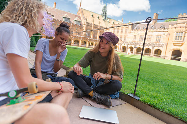 australian university studenten - australia aborigine group of people friendship stock-fotos und bilder