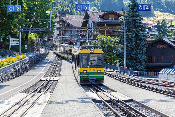 cogwheel tren en wengen - interlaken railroad station train rural scene fotografías e imágenes de stock