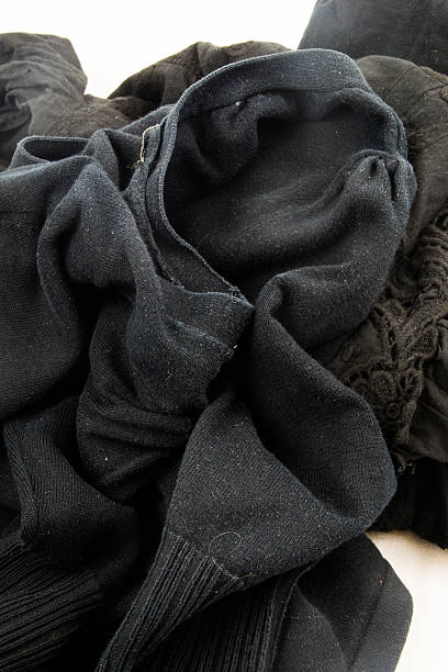 istock Recycling - a pile of black old clothes 502069300