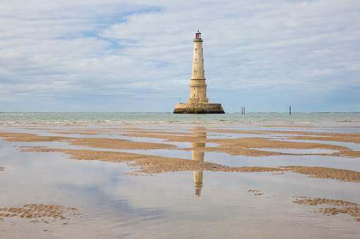 view of the historical lighthouse of Cordouan at low tide, Gironde estuary, France