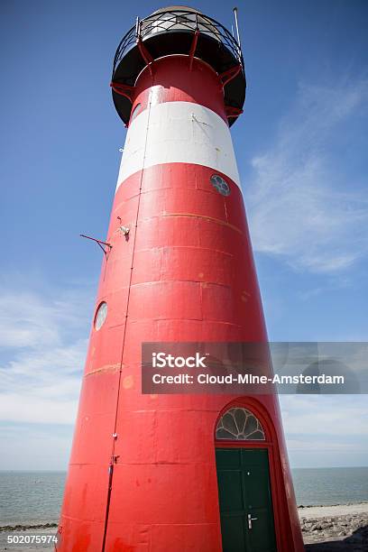 Red And White Lighthouse Blue Sky Background Westkapelle The Netherlands Stock Photo - Download Image Now