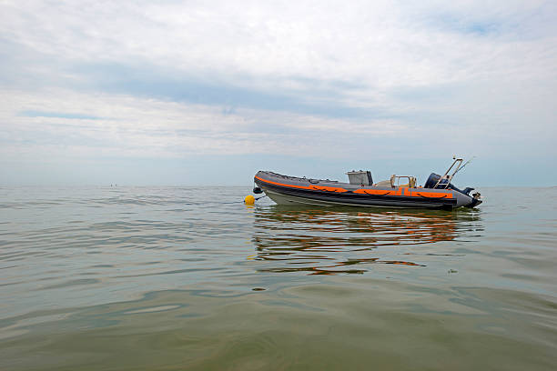 istock Motorboat floating at sea in summer 502086535