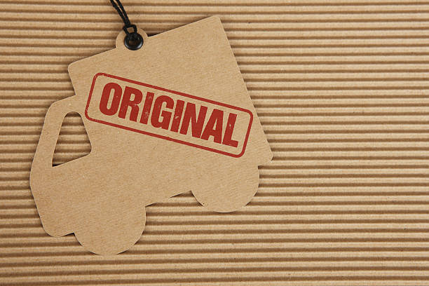istock Original Stamp on Delivery Truck Tag on Corrugated Cardboard 502087739